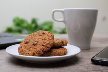 Close up of cookies with coffee on the table