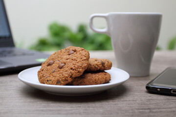 Close up of cookies with coffee on the table