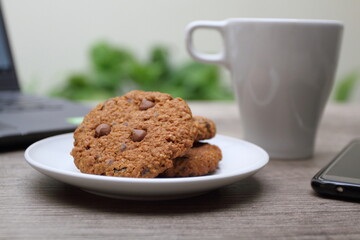 Close up of cookies with coffee on the table