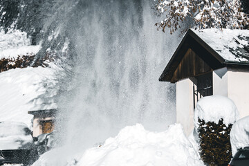 Suburb or village with snow chaos and avalance, winter season