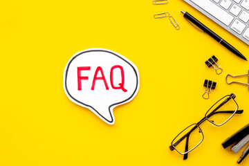 Information helpdesk concept with faq frequently asked questions text on working place