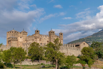 The ancient Fénis Castle at the first light of day, Aosta Valley, Italy