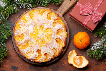 Citrus dessert holiday cake with tangerines