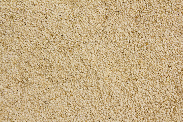 Heap of organic natural sesame seeds.