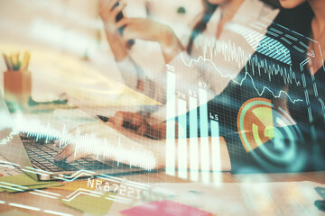 Double exposure of woman hands typing on computer and technology theme drawing. High Tech concept.