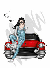 Beautiful girl in stylish clothes and a retro car. Fashion & Style.