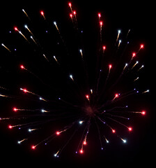 Fototapeta na wymiar Colorful fireworks over city at night.