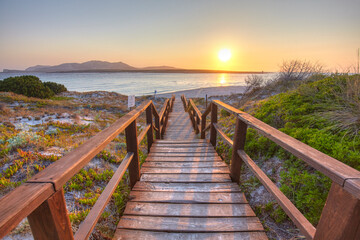 Footbridge to the beach of La Pelosa in Stintino, Sardinia, Italy