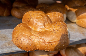Fresh Challah with sesame seeds sold at the city farmers market