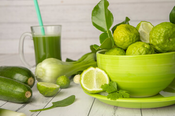 Green vegetables on white wooden background, healthy lifestyle, vegetarian eating