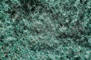 Closeup detailed carpet surface, fibers, dirt top view. Macro texture and structure of fabric