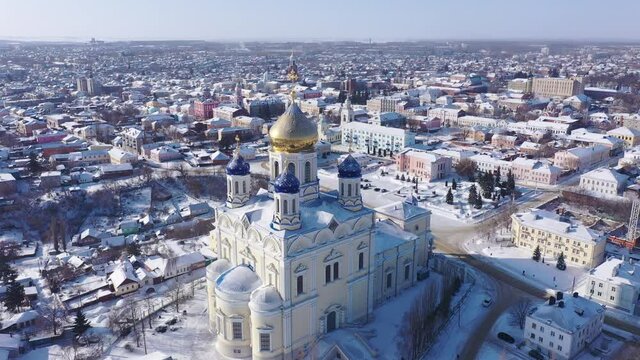 Scenic aerial view of main Orthodox church in Russian city of Yelets, five domed Ascension Cathedral on sunny winter day