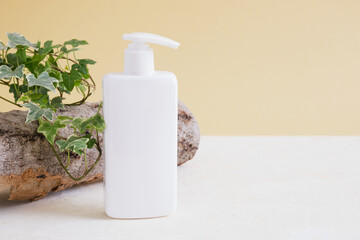 white empty bottle without label for cosmetic product, tree bark natural body skin care