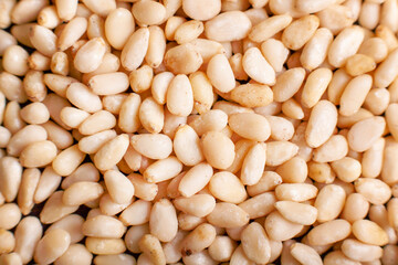 Background of Organic Pine nuts close up top view flat lay