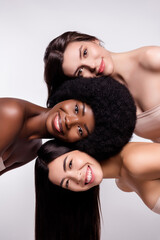 Photo of three young attractive girls happy positive smile hair care clean isolated over grey color background