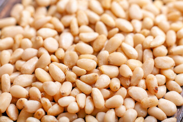 Background of Organic Pine nuts close up top view flat lay