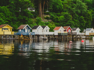 Fototapeta premium Small colorful fish boat houses in Oslo fjord in Norway.