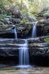 slow motion flowing water of a waterfall in the Blue Mountains Australia