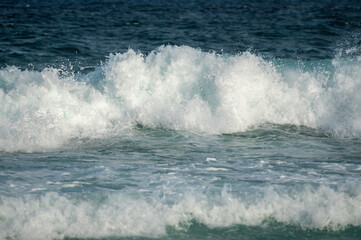 turquoise waves crashing at the beach