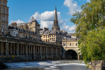 The famous Pulteney Bridge, Bath with shops lining both sides. A crossing over the River Avon