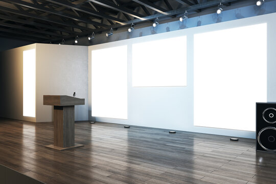 Contemporary auditorium interior with empty posters and wooden parquet flooring with reflections. Speaker and presentation concept. Mock up, 3D Rendering.