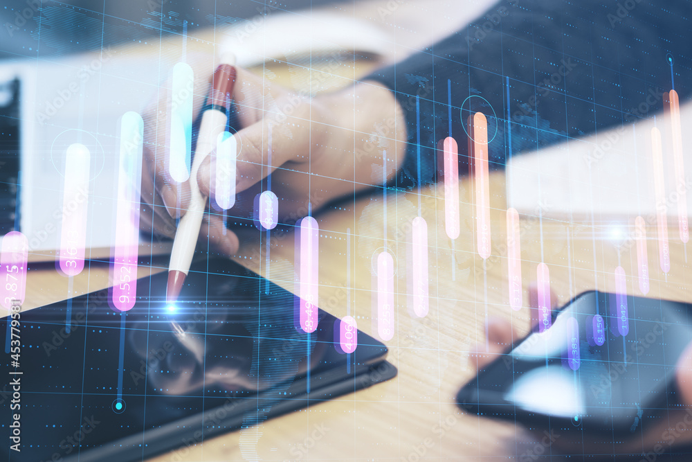 Poster Close up of hands using tablet at desktop with creative glowing business graph and map on blurry background. Global investment and profit concept. Double exposure.