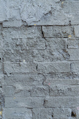 Brick wall texture stained with cement