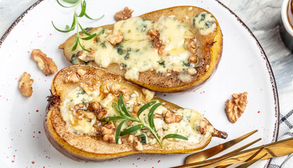 pear with blue cheese, nuts and honey. French cuisine. Delicious breakfast or snack, Clean eating, dieting, vegan food concept. top view