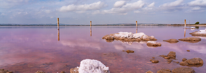 Salt rocks at Torrevieja Pink Lake at Natural Park de Las Lagunas de La Mata e Torrevieja, Alicante...