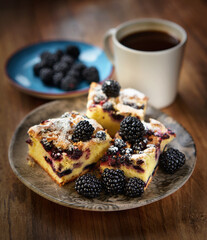 Breakfast with blackberry pie and coffee