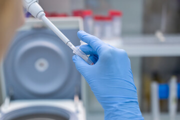 Laboratory technician isolates blood cells