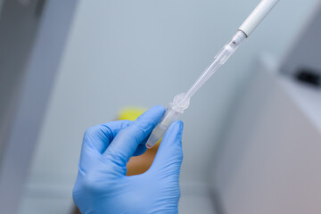 Laboratory technician isolates blood cells