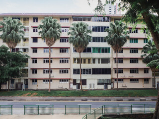 View of an old HDB apartment building in a residential neighbourhood in Singapore