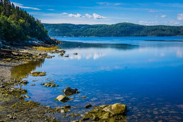 View on the Saguenay Fjord and the small (very small) port of L'Anse De Roche, cute little village of Quebec, Canada