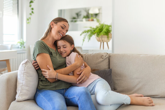 I Love You So Much. Portrait Of Happy Young Mother Piggybacking Cute Smiling Little Daughter In Living Room, Affectionate School Age Girl Embracing Beloved Millennial Female Nanny Or Foster Mom