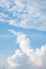 Abstract beautiful fluffy cloudy and cloudscape which sunny blue sky as a background.
