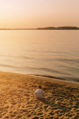 child watching the sunset