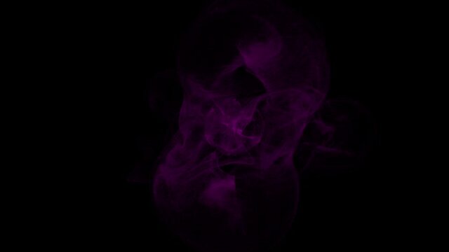 Pink smoke moving and explosion on black background 4k footage