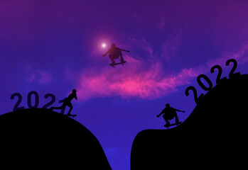 Silhouette Play Skateboard exercise. Concept Jump Skateboard New Year's Eve 2021,welcome New Year celebration 2022.