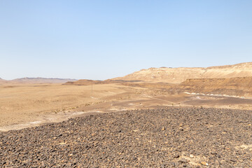 Fototapeta na wymiar Stone desert near HaMinsara, near Mitzpe Ramon, in the south of Israel.