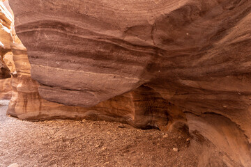 Narrow  passage between rocks in a nature reserve near Eilat city - Red Canyon, in southern Israel