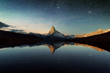 Incredible night view of Stellisee lake with Matterhorn peak in Swiss Alps
