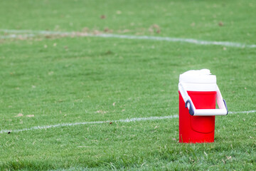 Water Jug along the sideline of a football or soccer field