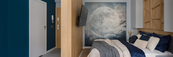 Stylish bedroom with decorative wall mural, panorama