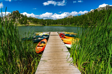 Kayaks docked at the lake pier in Custer state park, South Dakota, USA