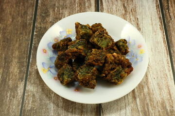 Deep fried chives dumpling serving on the plate. Famous traditional dim sum menu in Asia...
