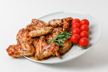 Chicken Wings On Levitation Plate Isolated On White Background. Side View.