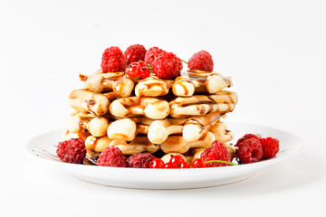 Belgium Waffles With Raspberry And Chocolate Sauce On White Background. Side View.