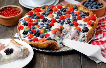 Berries Tart With White Cream On Wooden Background. Side View.