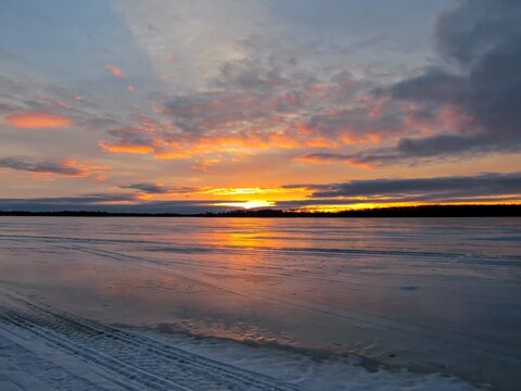 Sunrise at frozen lake Simcoe, Ontario, Canada